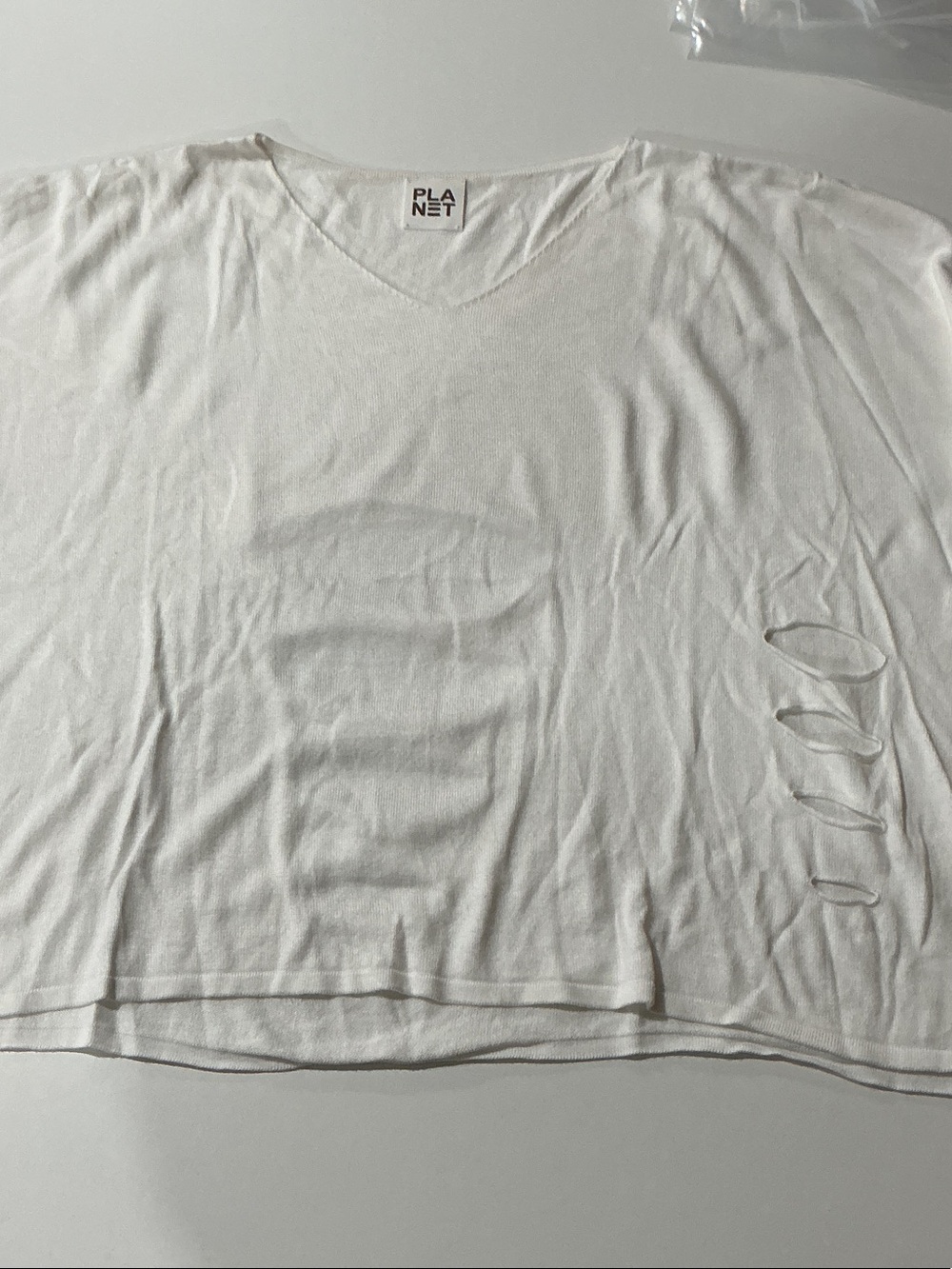 Planet White V-Neck Short Sleeve Top with Side Cutouts